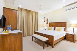 Seashell Suites and Villas- Candolim Goaにあるベッド