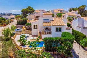 an aerial view of a house with a swimming pool at Villas Monte Jávea - BTB in Jávea