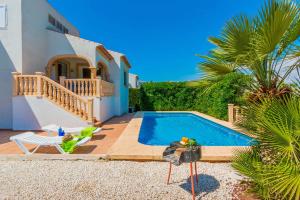 a villa with a swimming pool and a house at Villas Monte Jávea - BTB in Jávea