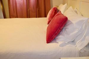 Posteľ alebo postele v izbe v ubytovaní Hostal Extramuros