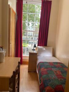 Postel nebo postele na pokoji v ubytování European Hotel