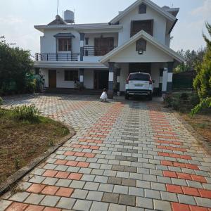 Imagen de la galería de Bridge Point Home Stay, en Kushālnagar