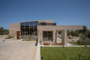 a rendering of a house with a yard at Bliss Villas in Rethymno Town