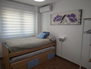 Postel nebo postele na pokoji v ubytování Piso Céntrico Armilla