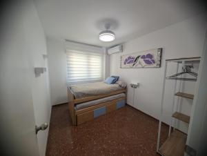 Postel nebo postele na pokoji v ubytování Piso Céntrico Armilla