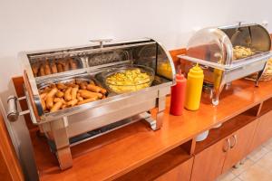 a buffet with many different types of food at City Central De Luxe in Prague