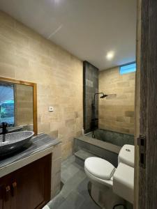 Ένα μπάνιο στο Tebanyoman Guesthouse