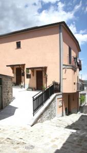 a large building with a balcony on the side of it at Monteverde in Latronico