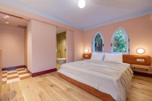 Postel nebo postele na pokoji v ubytování Yonca Anjelika Otel
