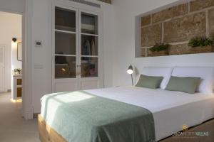 Ένα ή περισσότερα κρεβάτια σε δωμάτιο στο Villa Veles Dos +35 φωτογραφίες