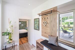 Postel nebo postele na pokoji v ubytování Gerhart-Hauptmann-Strasse 1a Ferienhaus Gartenidylle