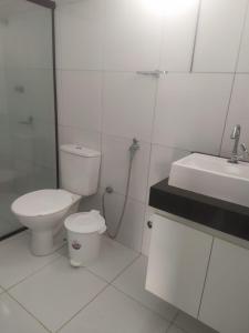 Phòng tắm tại Pousada Sol e Mar