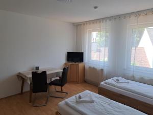 Posteľ alebo postele v izbe v ubytovaní Hotel MEDITERRANEO