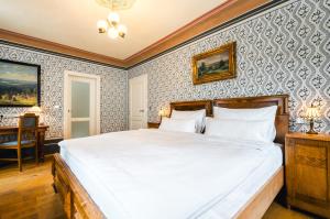 Letto o letti in una camera di Hotel Latrán