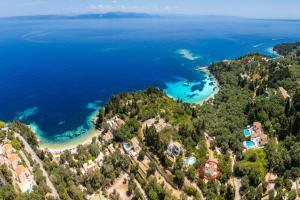an aerial view of a beach and the ocean at Eleni Cottage in Longós +7 photos