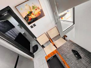 TV a/nebo společenská místnost v ubytování blue Hotel