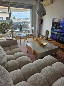 Posezení v ubytování Le Duplex
