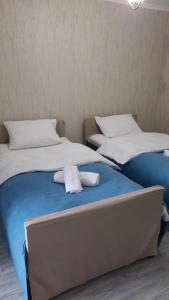 A bed or beds in a room at Maganiskhedi
