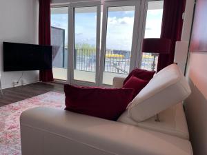 Μια τηλεόραση ή/και κέντρο ψυχαγωγίας στο Luxusapartment in Bestlage
