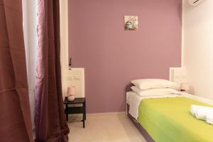 Letto o letti in una camera di Adam Eric