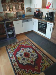 Kuchyň nebo kuchyňský kout v ubytování Appartement Ingrid