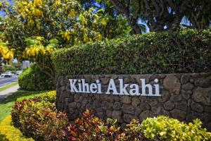 a sign for the kilt ahalili sign on a stone wall at Kihei Akahi Resort - Unit D114 in Wailea