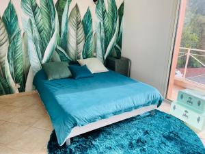 Postel nebo postele na pokoji v ubytování Villa Sì- Villa indépendante 3 chambres avec piscine et magnifique vue mer en plein centre de Porticcio + 10 fotografií