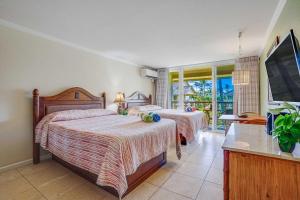 Katil atau katil-katil dalam bilik di Islander on the Beach 356 +44 gambar