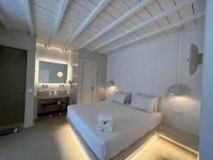 Cama ou camas em um quarto em Paolas Sunset