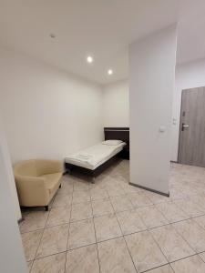 Łóżko lub łóżka w pokoju w obiekcie Artel Villa Tarsis