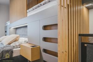 Postel nebo postele na pokoji v ubytování MINIMAX apartmán