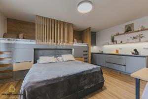 Postel nebo postele na pokoji v ubytování MINIMAX apartmán