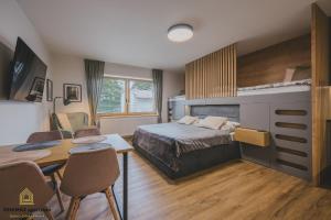 Postel nebo postele na pokoji v ubytování MINIMAX apartmán