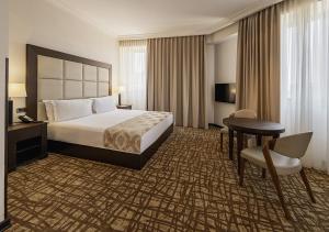 Voodi või voodid majutusasutuse National by Stellar Hotels, Yerevan toas