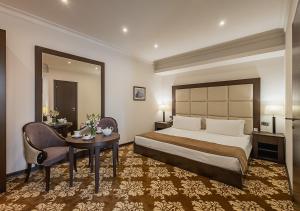 Voodi või voodid majutusasutuse National by Stellar Hotels, Yerevan toas