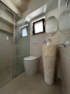 Koupelna v ubytování Il Trullo di Bina