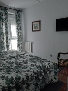 Postel nebo postele na pokoji v ubytování Hotel Los Caspios