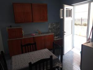 Kuchyň nebo kuchyňský kout v ubytování Ida Apartments