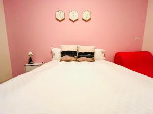 Postel nebo postele na pokoji v ubytování Monkey Travel B&B
