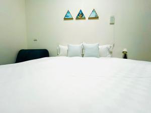 Postel nebo postele na pokoji v ubytování Monkey Travel B&B