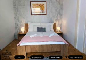Posteľ alebo postele v izbe v ubytovaní Black Sheep Budapest Smart Rooms