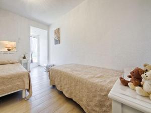 Кровать или кровати в номере Maison Cogolin Panorama du Golf