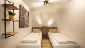 Ένα ή περισσότερα κρεβάτια σε δωμάτιο στο Kabbelaarsbank 216 - Port Marina Zélande NOT INTENDED FOR COMPANY OR WORK-RELATED STAYS