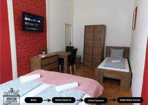Posteľ alebo postele v izbe v ubytovaní Black Sheep Budapest Smart Rooms