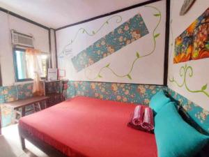 Voodi või voodid majutusasutuse el nido hostel sun valley toas