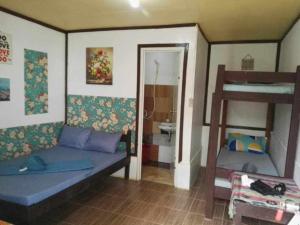 Voodi või voodid majutusasutuse el nido hostel sun valley toas