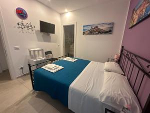 Letto o letti in una camera di Adam Eric