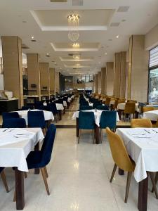 Vile Oliva Hotel & Resort餐厅或其他用餐的地方