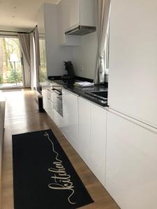 Kuchyň nebo kuchyňský kout v ubytování Vakantiewoning Mystiek