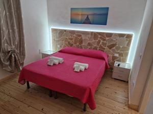 Postel nebo postele na pokoji v ubytování B & B Da Rosa